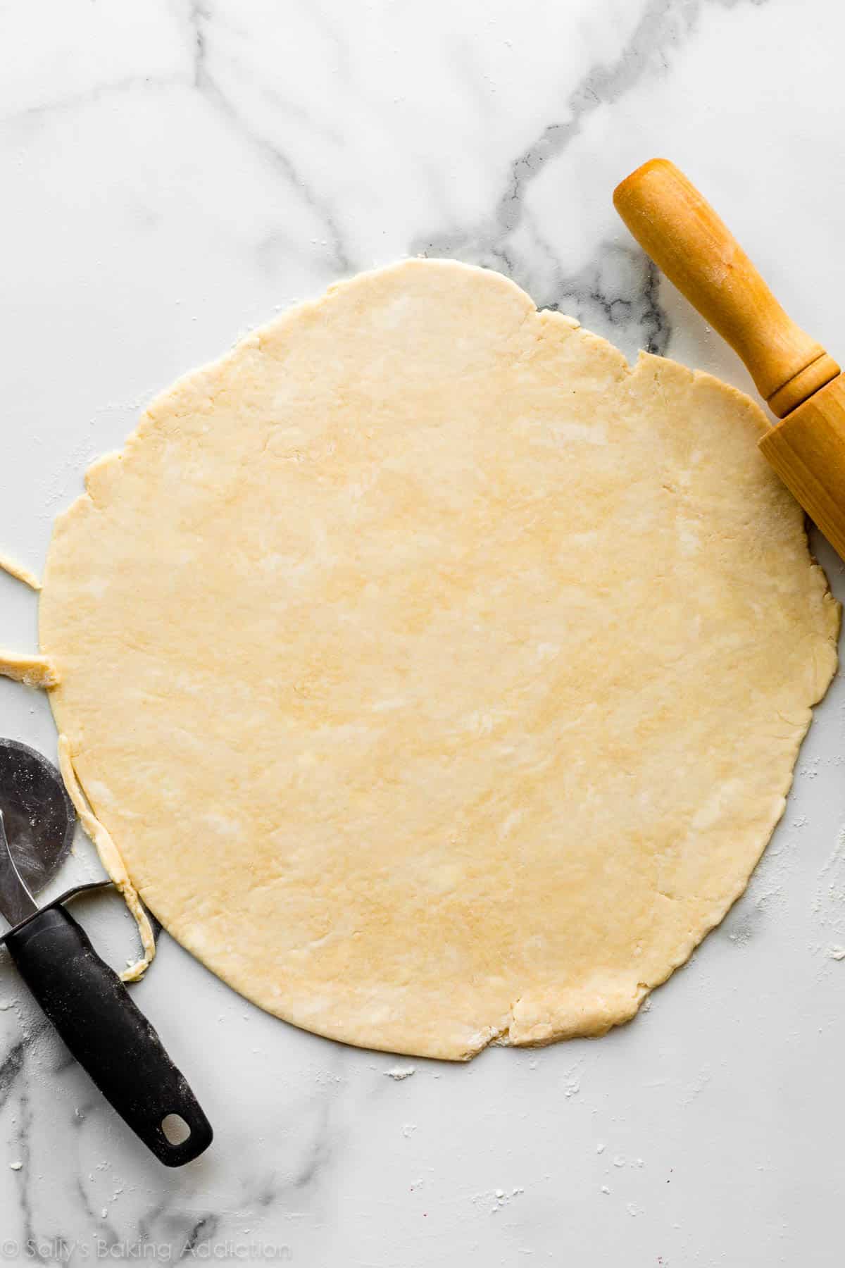 galette pie dough rolled out on counter