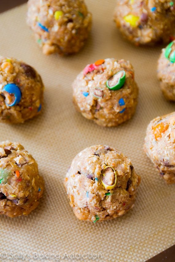 loaded oatmeal cookie dough balls on a silpat baking mat