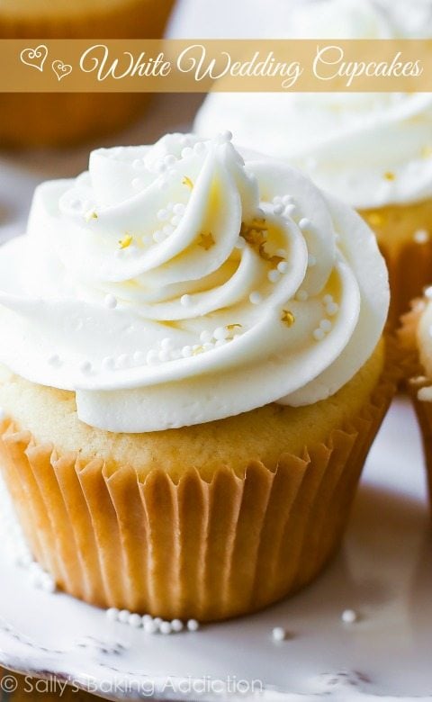 white wedding cupcakes on a white plate