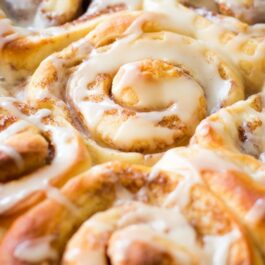 maple cinnamon rolls in a baking dish