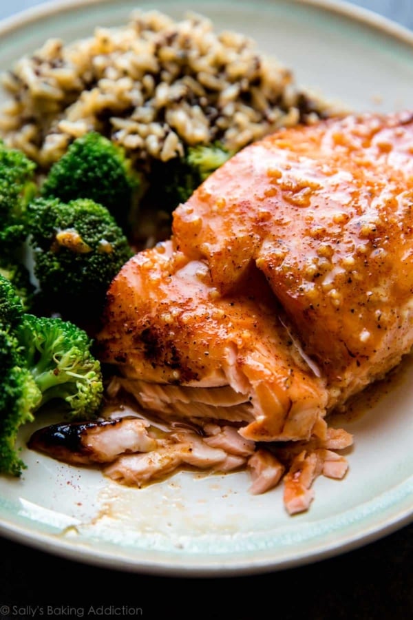 honey chipotle salmon on a plate with broccoli and rice