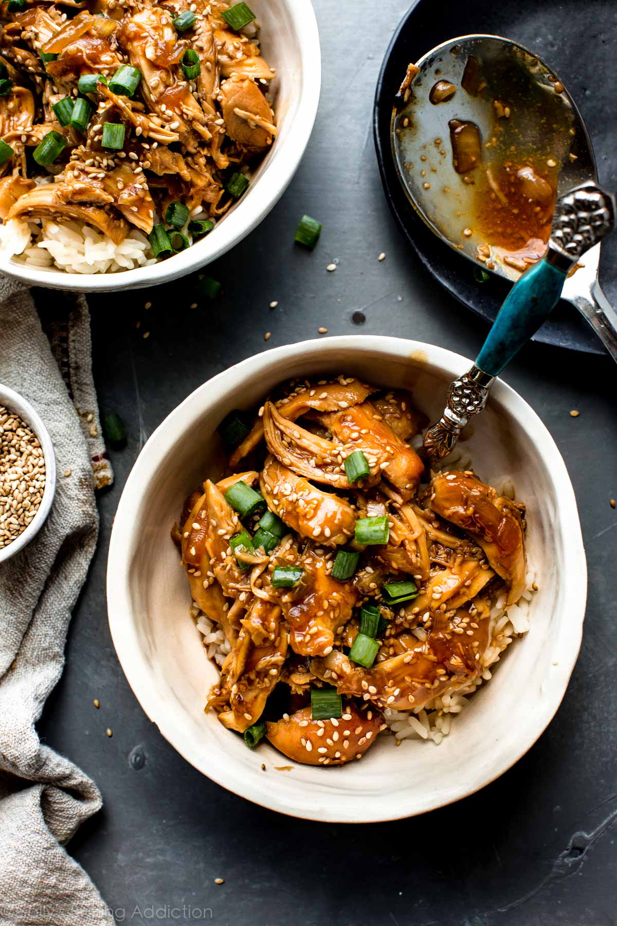 overhead image of teriyaki chicken in white bowls