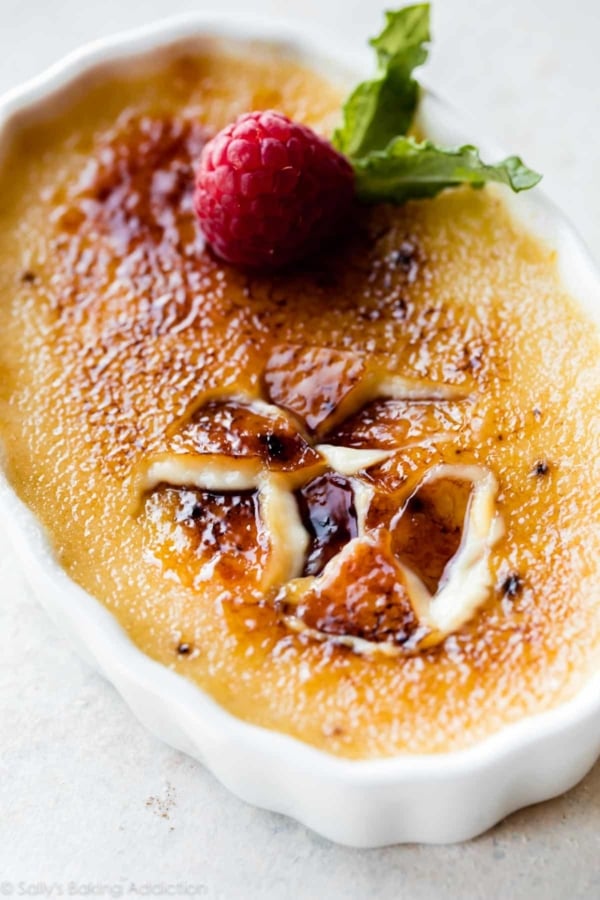 crรจme brรปlรฉe with a raspberry on top