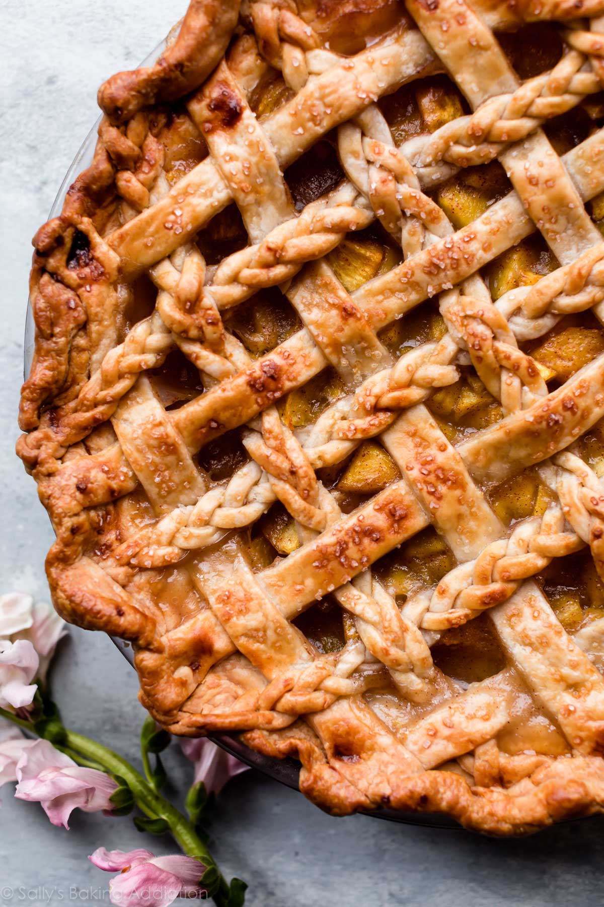 overhead image of peach pie after baking