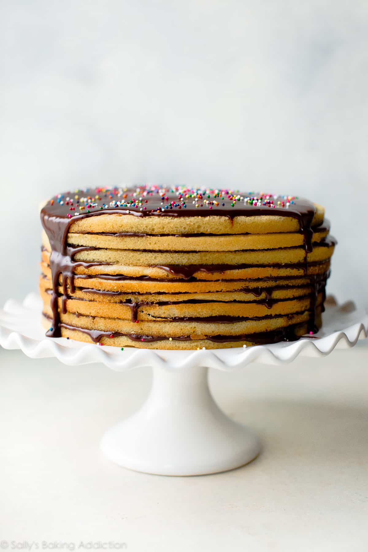 Smith Island cake on a white cake stand
