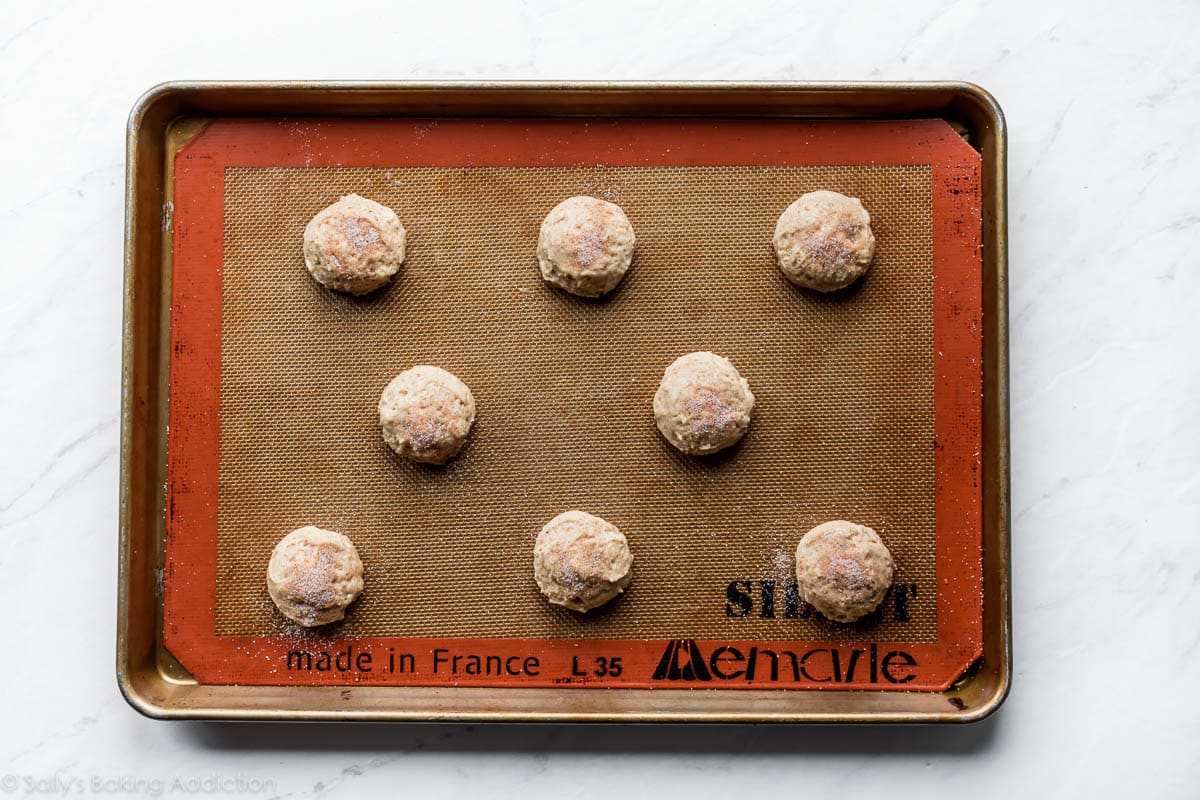 mounds of apple spice whoopie pie dough on baking sheet