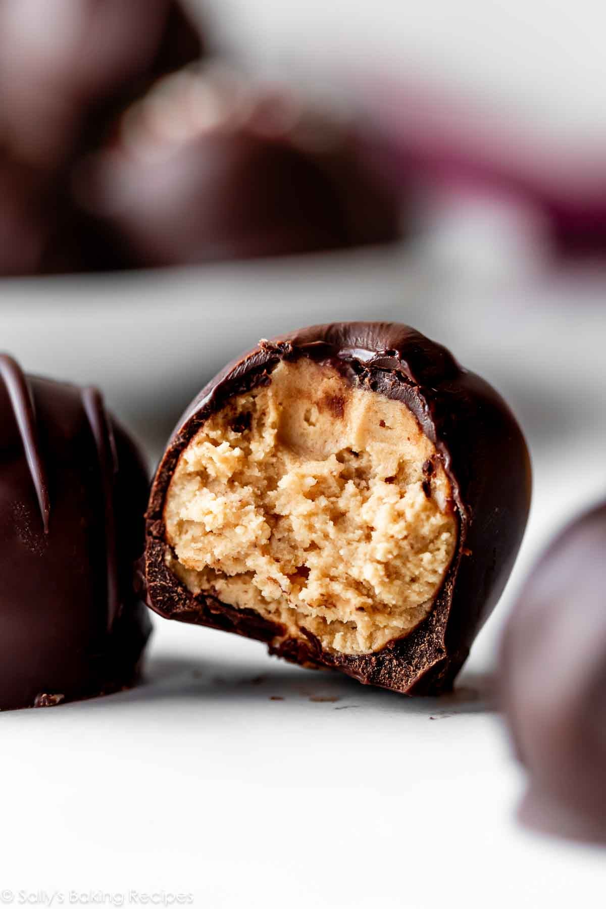 peanut butter ball with bite taken out.