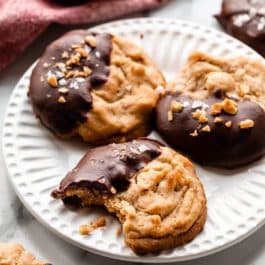 peanut butter chocolate half moons on white plate